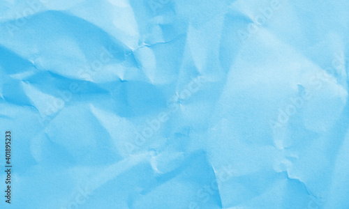 cyan colored crumpled paper texture background for design, decorative.
