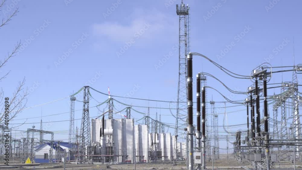 Electric power transmission tower is seen in a substation. Rosseti, Nevinnomyssk Electric power transmission tower is seen in a substation. Rosseti, Nevinnomyssk