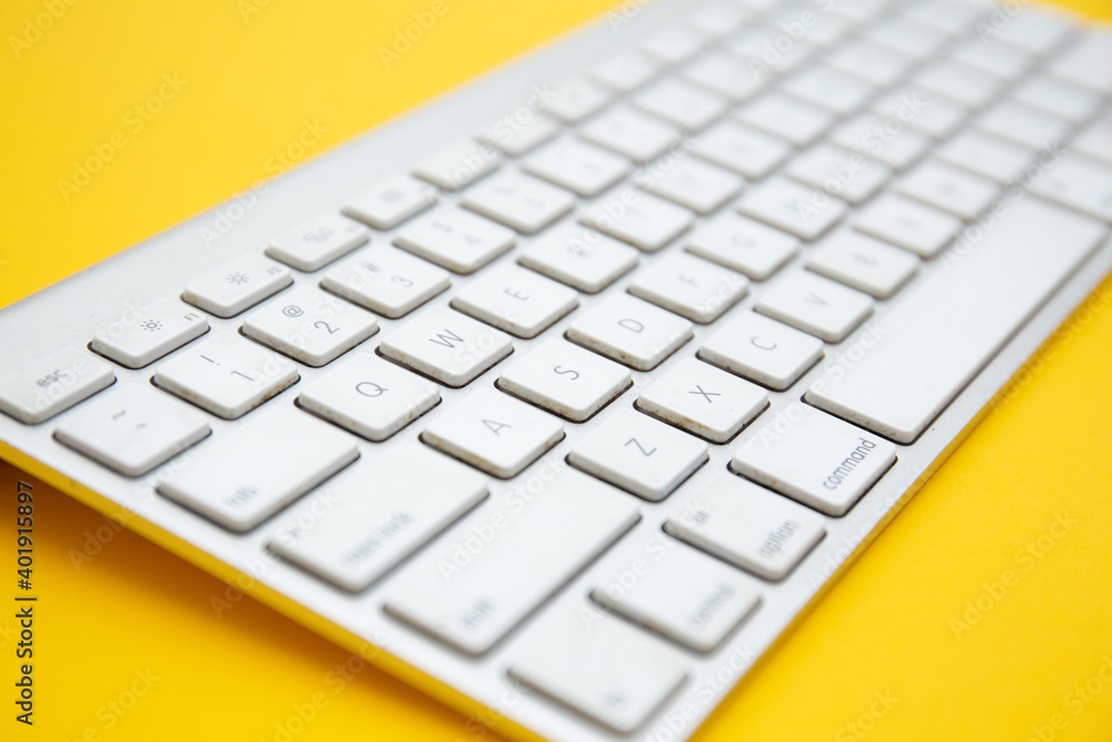 Close up shot of wireless keyboard isolated on white Close up shot of wireless keyboard isolated on white