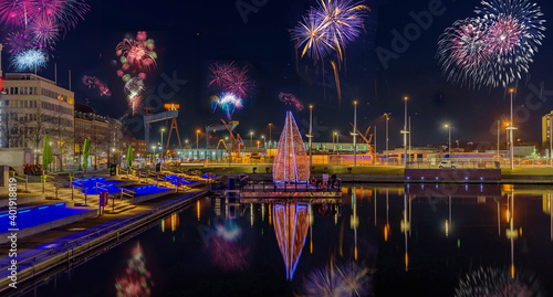 Photography Fireworks over Kiel at the boat harbor with a view of the harbor.