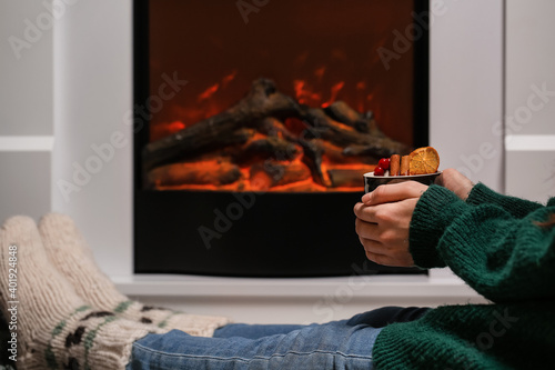 Woman with tasty mulled win...
