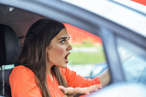 Fényképezés Stressed woman driver sitting inside her car
