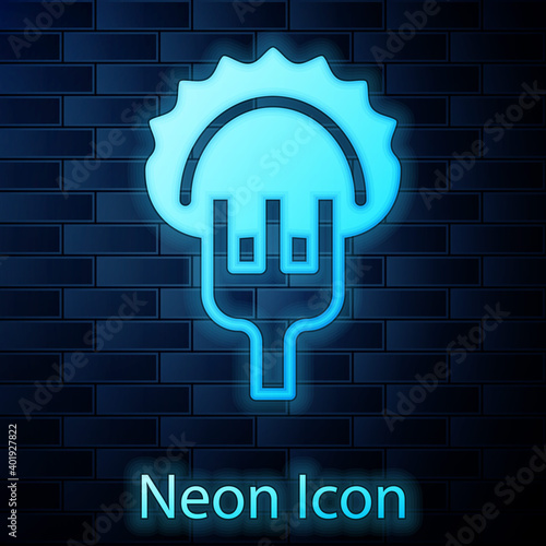 Glowing neon Dumplings on fork icon isolated on brick wall background. Pierogi, varenyky, pelmeni, ravioli. Traditional Ukrainian food. Vector.