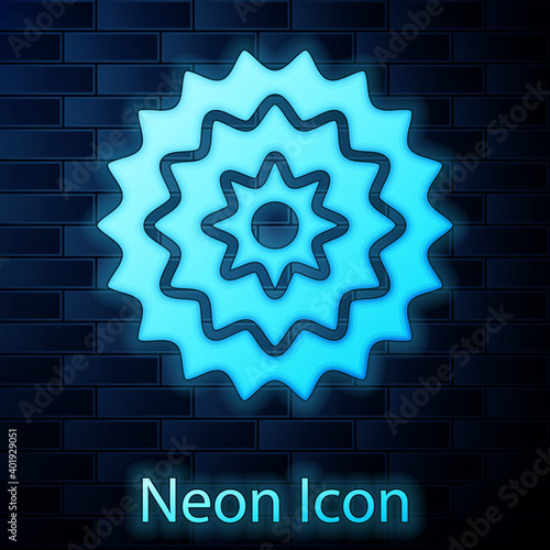 Glowing neon Bicycle cassette mountain bike icon isolated on brick wall background. Rear Bicycle Sprocket. Chainring crankset with chain. Vector.