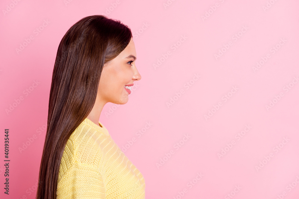 Photo of sweet charming young woman dressed casual clothes looking empty space isolated pastel pink color background Photo of sweet charming young woman dressed casual clothes looking empty space isolated pastel pink color background