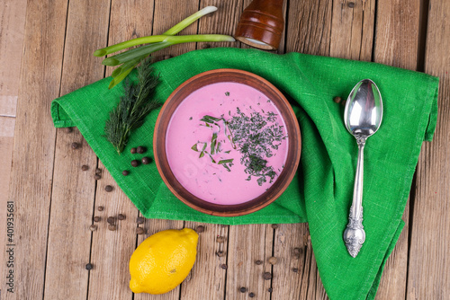 Cold borscht beet soup . This soup probably originated in the Lithuania. In the summertime, cold borscht is a popular alternative to the aforementioned variants. photo