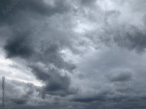 Dark clouds at the sky, stormy sky background