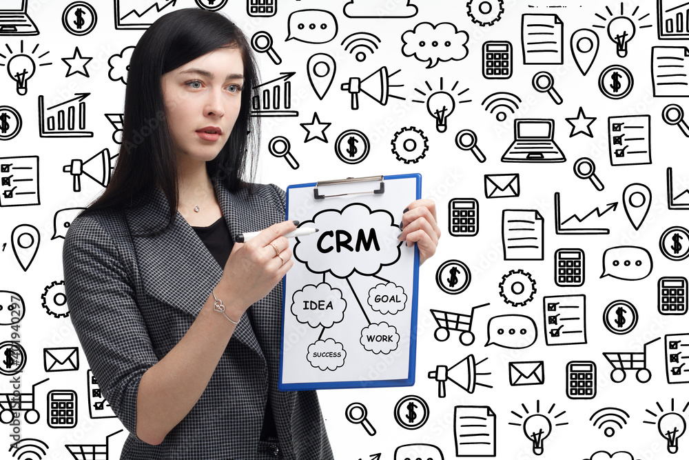 Business, technology, internet and network concept. Young businessman thinks over the steps for successful growth: CRM Business, technology, internet and network concept. Young businessman thinks over the steps for successful growth: CRM