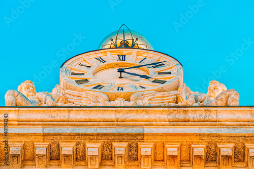 Big clock on building Bank of Spain (Banco de Espana) on Cibeles photo