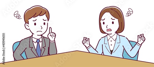 Male and female employees having a meeting