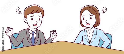 Male and female employees having a meeting