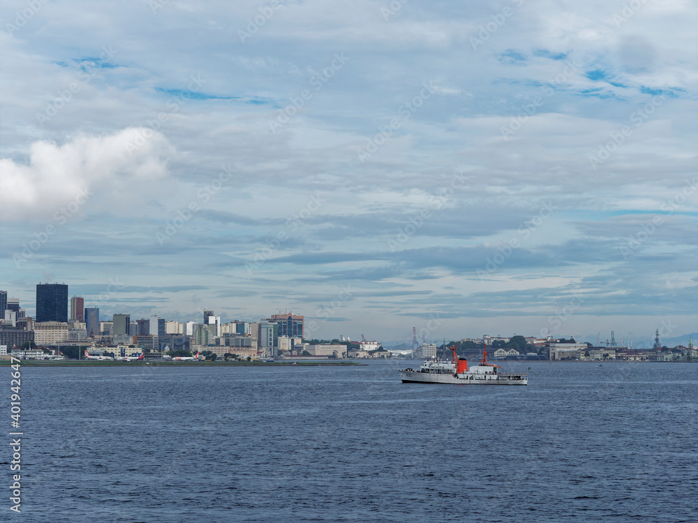 the Japanese Navy Oceanographic Survey Vessel Sirius anchored in the bay of Rio Old Port in front of the Santos Dumont Airport in December.