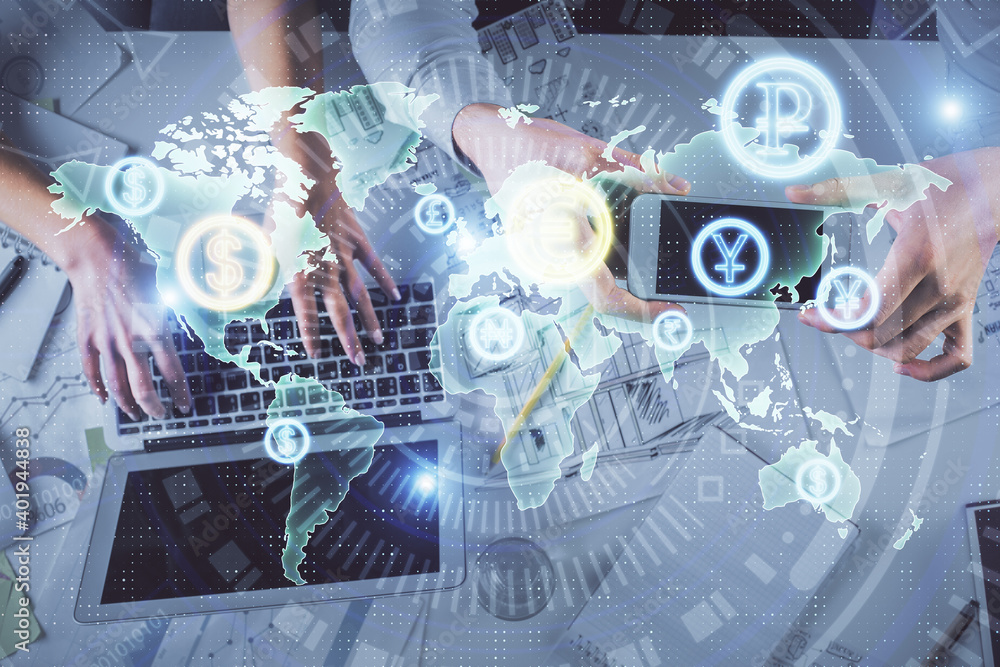 Multi exposure of man and woman working together and forex graph hologram drawing. Financial analysis concept. Computer background. Top View. Multi exposure of man and woman working together and forex graph hologram drawing. Financial analysis concept. Computer background. Top View.