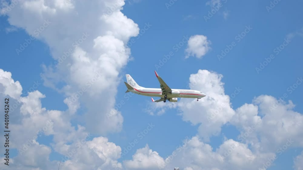Passenger plane flying in the blue sky. A mixture of clouds and blue sky provides a great backdrop. Passenger plane flying in the blue sky. A mixture of clouds and blue sky provides a great backdrop.