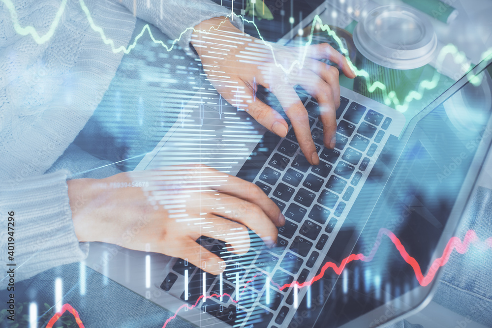 Double exposure of woman hands typing on computer and forex chart hologram drawing. Stock market invest concept. Double exposure of woman hands typing on computer and forex chart hologram drawing. Stock market invest concept.