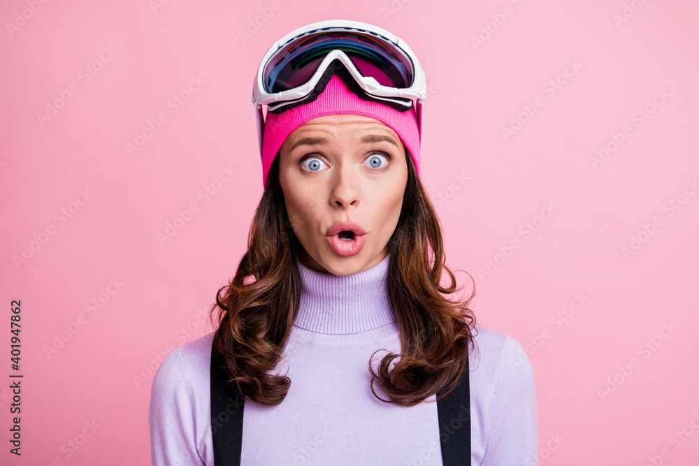 Photo portrait of amazed woman in sportswear isolated on pastel pink colored background Photo portrait of amazed woman in sportswear isolated on pastel pink colored background