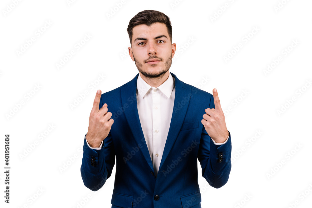 White businessman with brunette hair isolated on a white background pointing up with both hands White businessman with brunette hair isolated on a white background pointing up with both hands