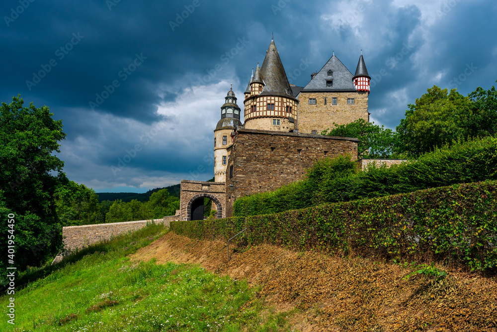 Storm clouds over Bürresheim Castle, Germany.
