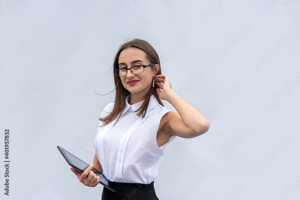 Pretty businesswoman with digital tablet computer isolated on white background