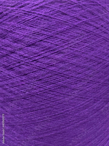 the texture of the purple thread in the coil as a background