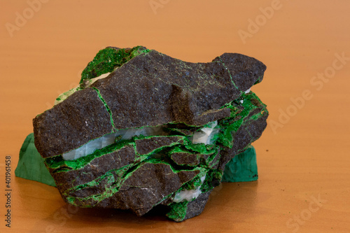 Peridotite to uvarovite and calcite on the table