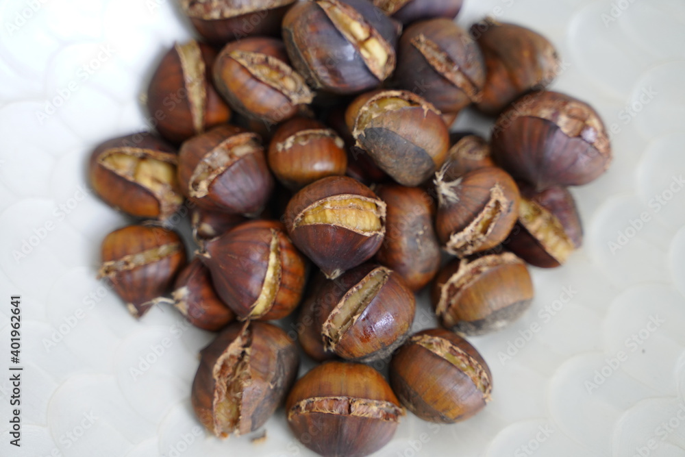 Fototapeta premium Roasted chestnuts are ready for sale hot.