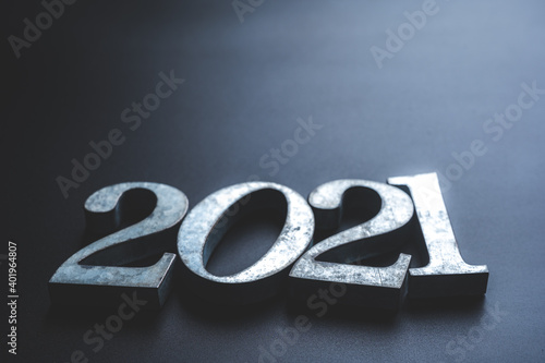 word number 2021 on dark ba...