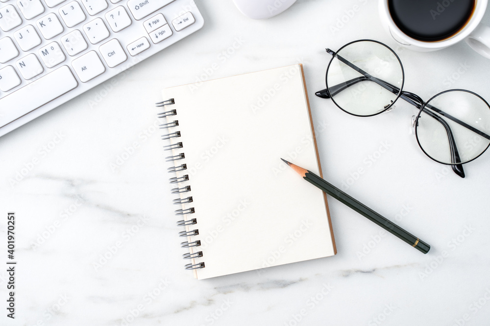Top view of office table desk cozy work concept on bright marble white background. Top view of office table desk cozy work concept on bright marble white background.