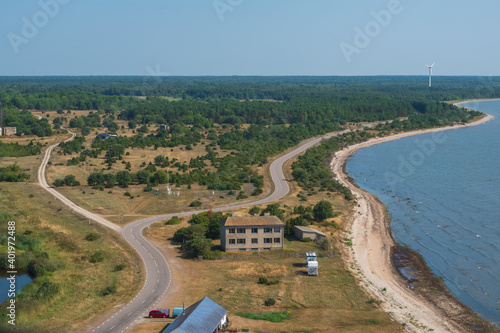  Aerial view to the Sõrve peninsula in Saaremaa island, Estonia on bright sunny day from top of the lighthouse. Focus on foreground