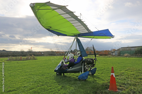 Valokuva Ultralight airplane in a landing field