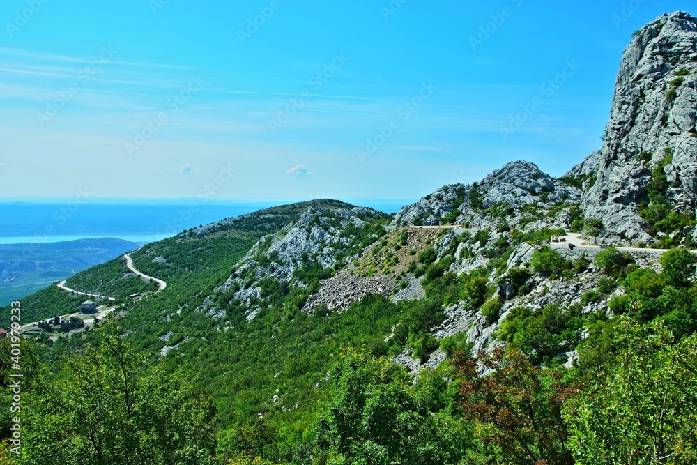 Croatia-view of the Church of St. Frane and rocky city of Tulove Grede in the Velebit National Park