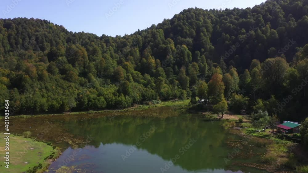 A panoramic video of Hendek Golyaka Kemerli Yaylasi. There is a lake that is placed in the middle of a forest. A panoramic video of Hendek Golyaka Kemerli Yaylasi. There is a lake that is placed in the middle of a forest.