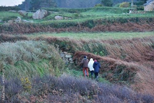 Group of people working on a path in Brittany © aquaphoto