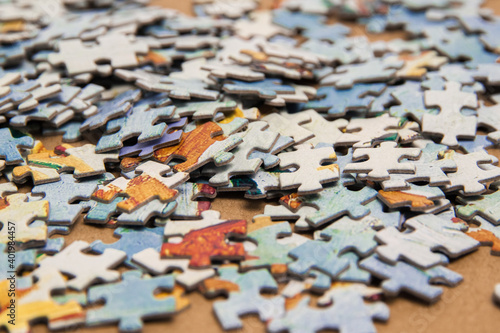 Colorful puzzle pieces, blurred focus at the edges