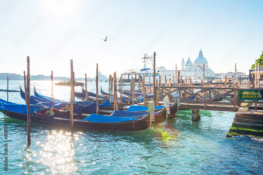 VENICE, ITALY- December 21, 2017 : Tourists on Water street with Gondola in Venice, ITALY