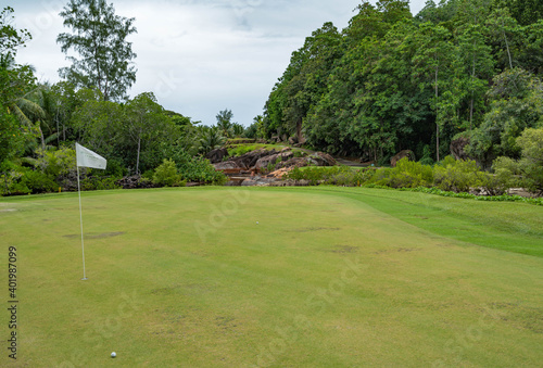 Lemuria Golf course hole nr. 5 green flag Resort Praslin Seychelles 