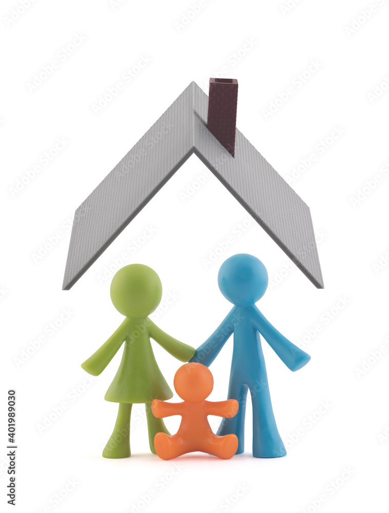 Colorful family figurines covered by house roof on white background Colorful family figurines covered by house roof on white background