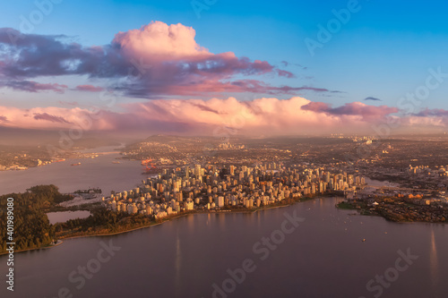 Aerial view of Stanley Park and Downtown Vancouver, BC, Canada. Dramatic Colorful Sunset Sky Art Render. © edb3_16