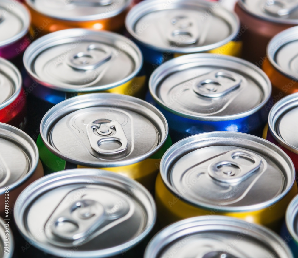 metal aluminum cans for Cola, beer, energy drinks and mineral water. Background of aluminum cans metal aluminum cans for Cola, beer, energy drinks and mineral water. Background of aluminum cans