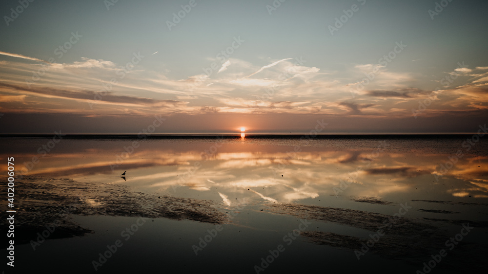 Sonnenuntergang im Wattenmeer am Reiseziel Dorum an der Nordsee