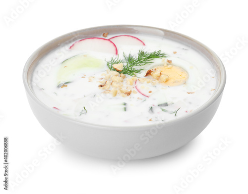 Delicious cold summer soup on white background