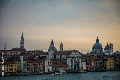A view of sunrise from the roof of Venice, with some famous churches, like the "Basilica di Santa Maria Della Salute" and the Campanile on the St. Marks Square
