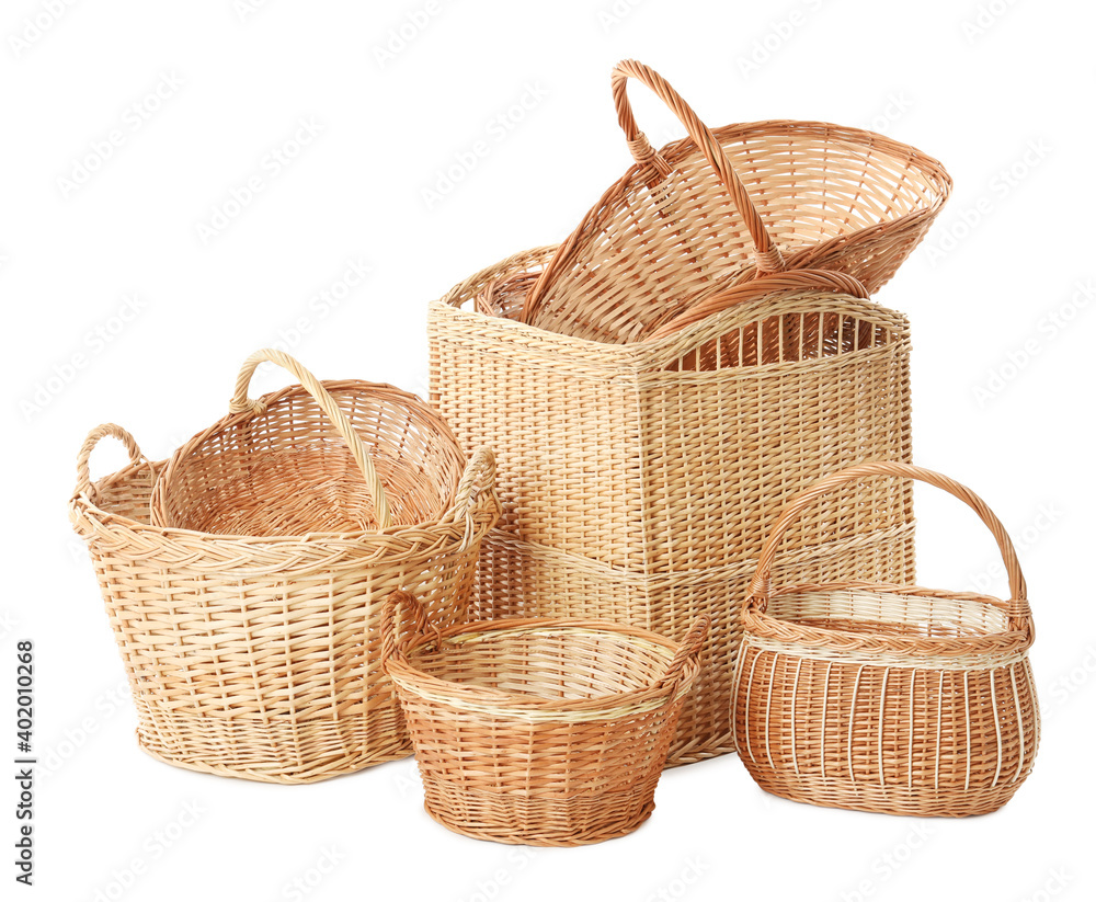 Many different wicker baskets on white background Many different wicker baskets on white background