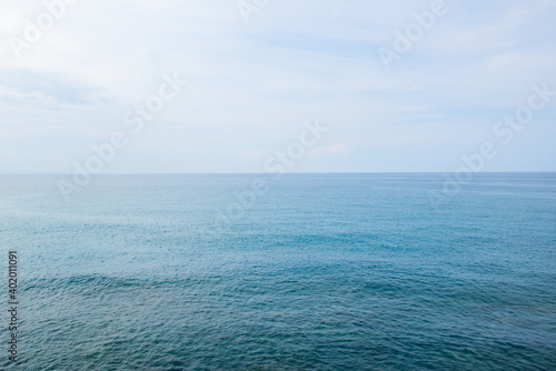 Landscape with calm Mediterranean sea in Sicily, Italy. © Khorzhevska