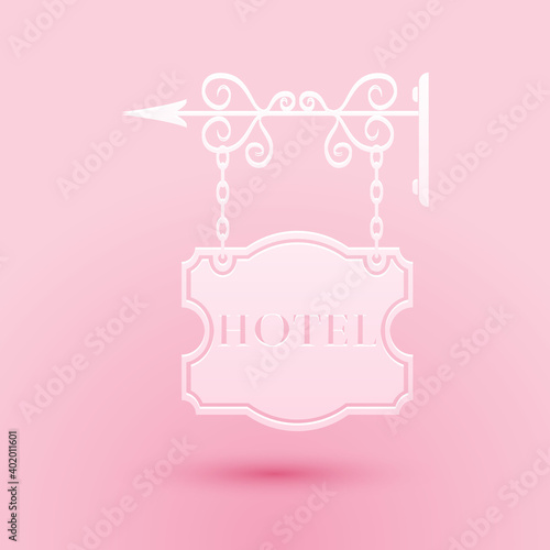 Paper cut Vintage signboard outdoor advertising with text Hotel icon isolated on pink background. Paper art style. Vector.