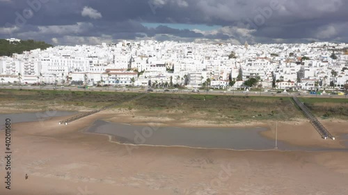 Atlantic ocean shore at the Beach of los Bateles in Conil de la Frontera aerial drone view