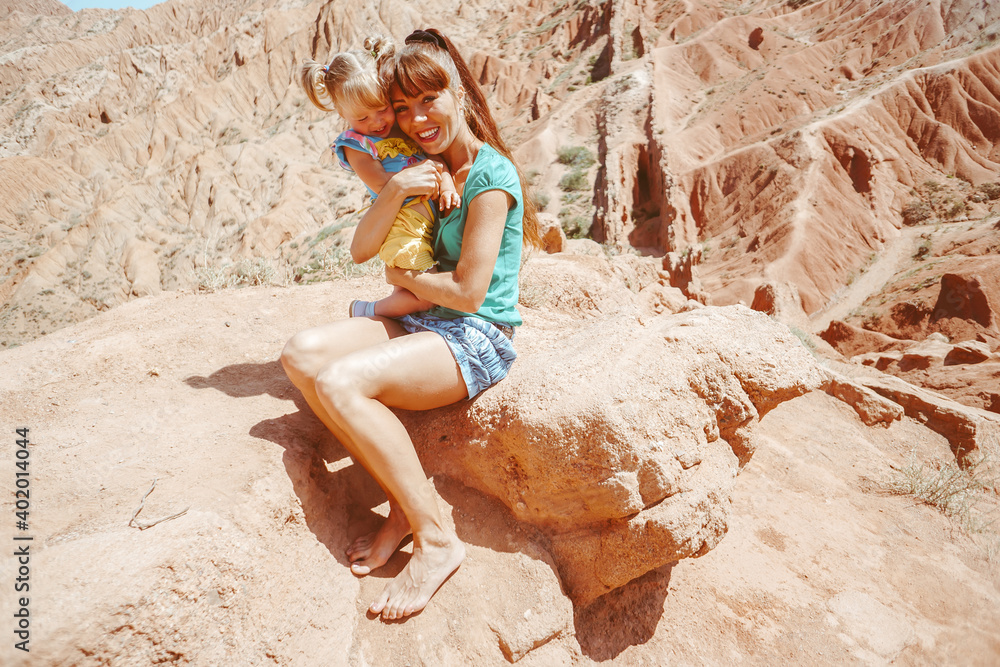 mother with child in the mountains