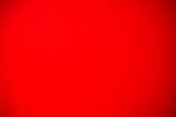 Abstract red cement wall texture and background. Red gradient background. Rich red texture. Abstract red background. Red abstract blurred gradient background