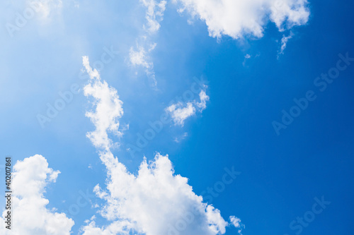 Fototapeta Naklejka Na Ścianę i Meble -  Fresh blue sky and soft white clouds, Bright blue sky with fluffy white clouds, The idea for the feeling of fresh weather, Bright blue sky with fluffy white clouds, Clean on a hot sammer day.