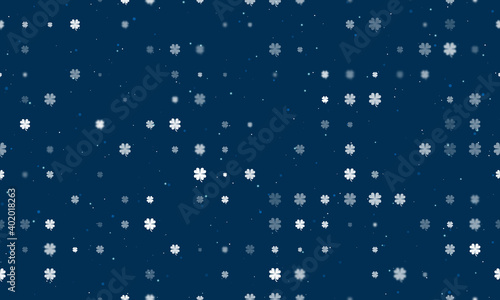 Seamless background pattern of evenly spaced white four-leaf clover symbols of different sizes and opacity. Vector illustration on dark blue background with stars